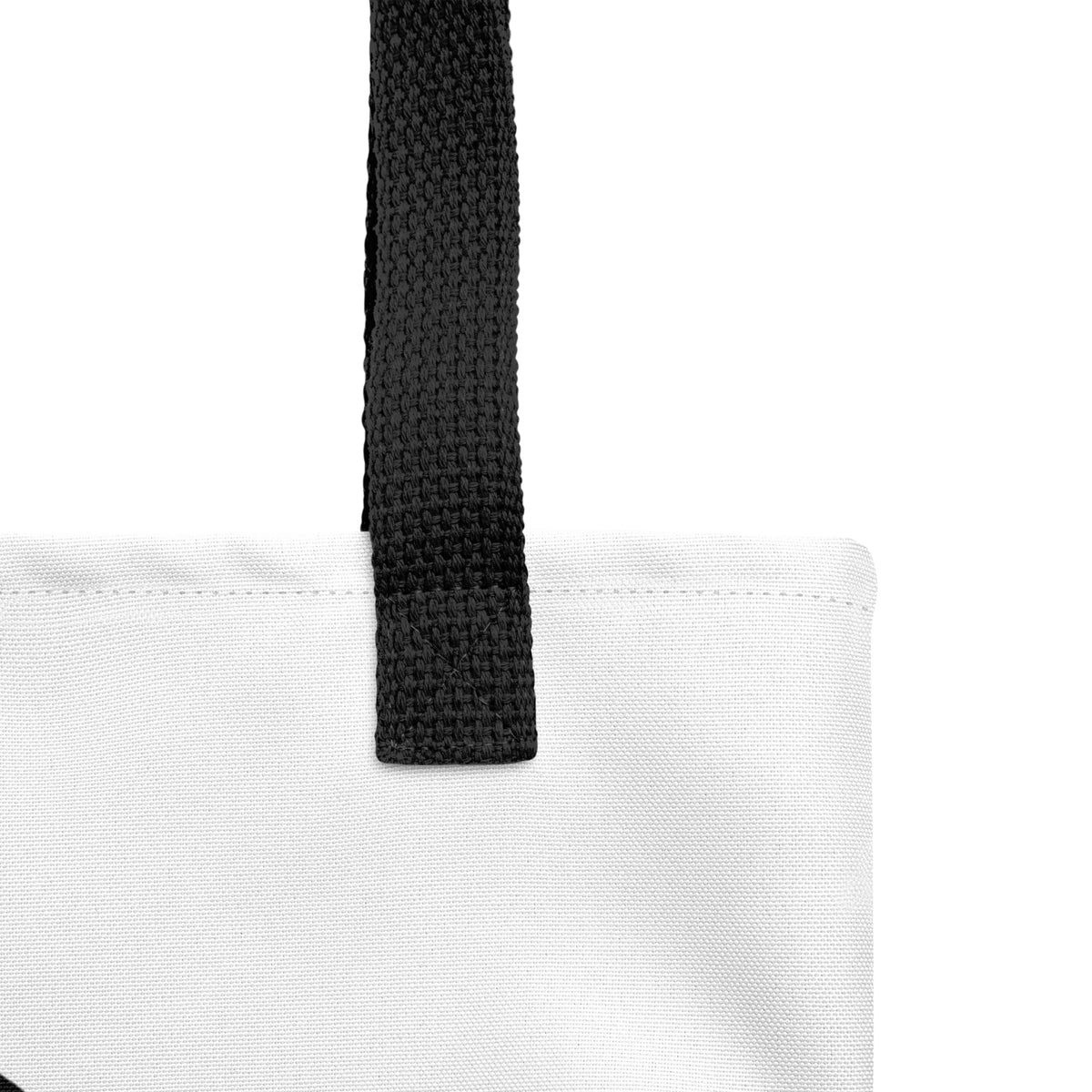Close-up of the Nimbus Jellyfish Tote Bag by Trees, Rivers & UFOs showing the black woven handle, top stitching and white fabric.