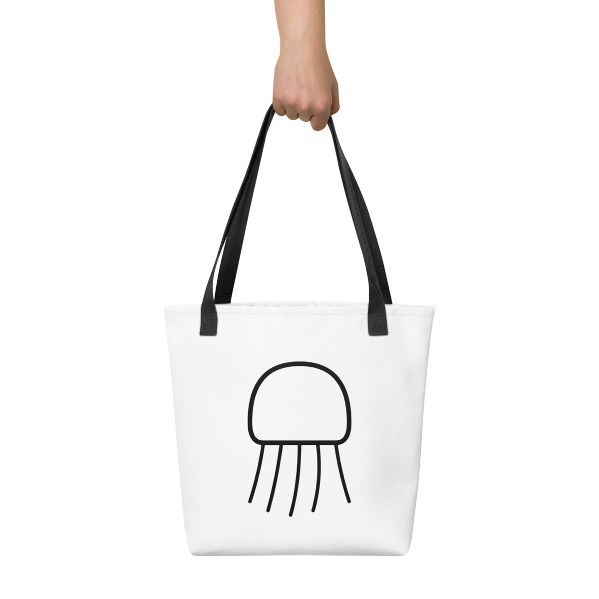 Front view of the Nimbus Jellyfish Tote Bag by Trees, Rivers & UFOs with monochrome black and white jellyfish artwork and black handles.