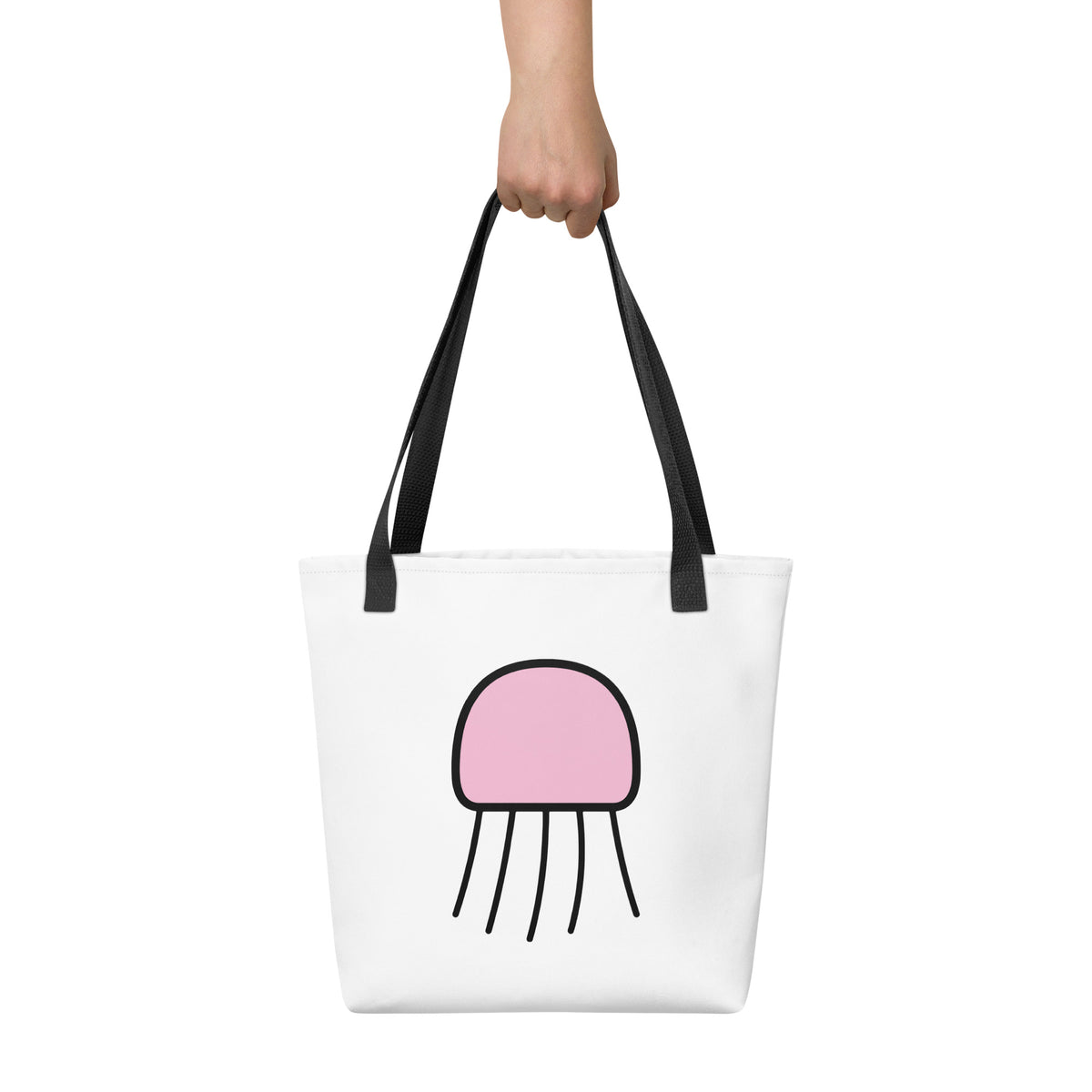 Front view of the Signal Jellyfish Tote Bag by Trees, Rivers & UFOs with pink jellyfish artwork, black outlines and black handles.