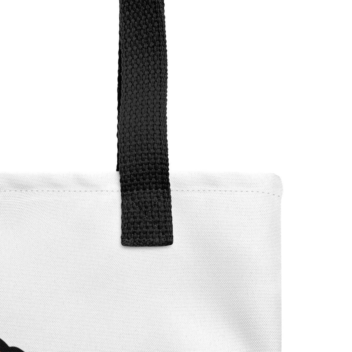 Close-up of the Treehouse Homes Tote Bag by Trees, Rivers & UFOs showing the black woven handle, top stitching and white fabric.